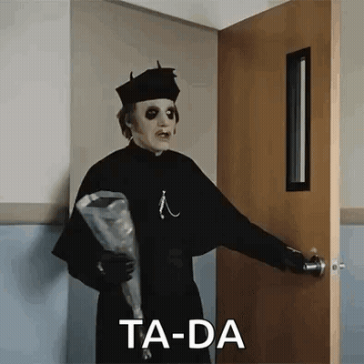 A Person In A Ghost Costume Is Holding A Bouquet Of Flowers And Standing In Front Of A Door . GIF