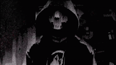 A Person In A Hooded Sweatshirt With A Grim Reaper On It GIF