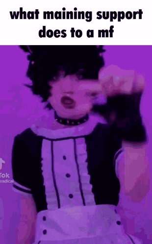 A Person In A Maid Outfit Is Making A Gesture With Their Finger While Wearing A Choker . GIF