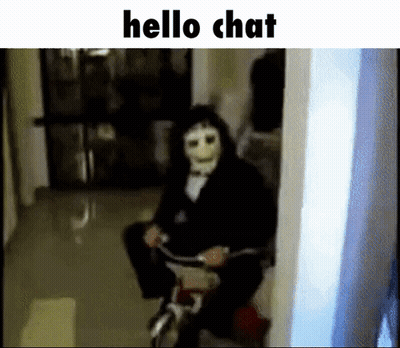 A Person In A Mask Is Riding A Bicycle In A Hallway . GIF