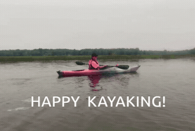 A Person In A Pink Kayak With The Words Happy Kayaking Behind Them GIF