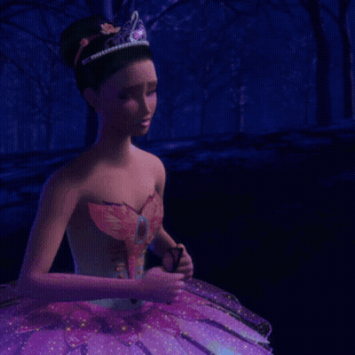 A Person In A Purple Flower Costume Is Crawling On The Ground GIF