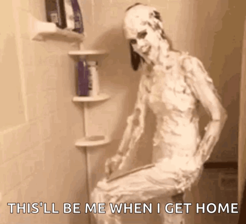 A Person In A Shower With Shaving Cream On Their Body GIF