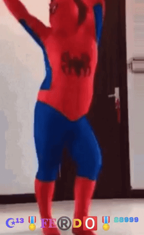A Person In A Spider Man Costume Is Dancing In Front Of A Door GIF