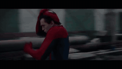 A Person In A Spider-Man Costume Is Running On A Bridge . GIF