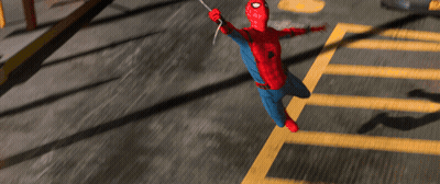 A Person In A Spiderman Costume Is Flying Over A Parking Lot GIF