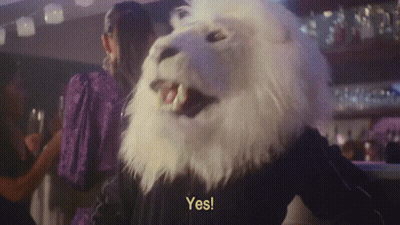 A Person In A White Lion Mask Says Yes GIF