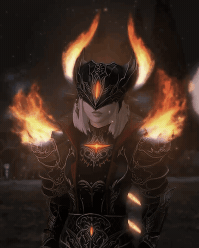 A Person In Armor With Flames Coming Out Of Them GIF