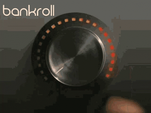 A Person Is Adjusting A Knob With The Word Bankroll On The Bottom GIF