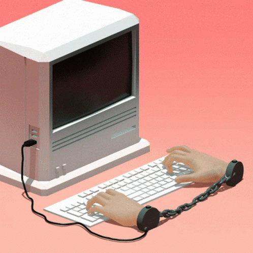 A Person Is Chained To A Keyboard With A Computer In The Background GIF
