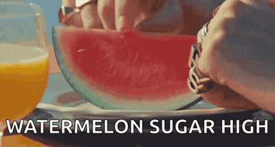 a person is cutting a slice of watermelon with the words watermelon sugar high below it .
