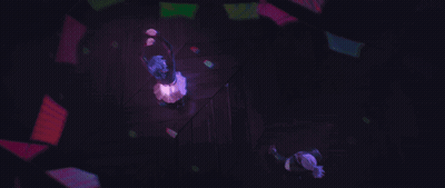A Person Is Dancing In A Dark Room With A Purple Light Shining On Them GIF
