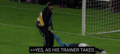 A Person Is Doing A Handstand On A Soccer Field With The Words Gazelle Through The Serengeti Above Them GIF