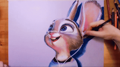 A Person Is Drawing A Cartoon Rabbit With Headphones GIF