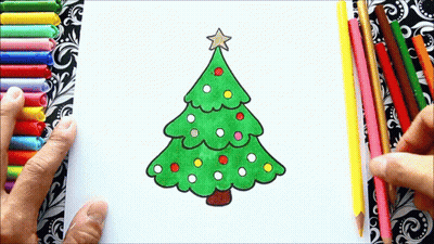 A Person Is Drawing A Christmas Tree On A Piece Of Paper GIF