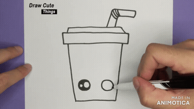 A Person Is Drawing A Cup With A Straw On A Piece Of Paper GIF