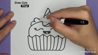 A Person Is Drawing A Cupcake On A Piece Of Paper With The Words Draw Cute Things Below It GIF