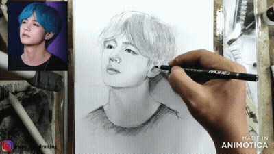 A Person Is Drawing A Picture Of A Man With Blue Hair Using A Marker GIF
