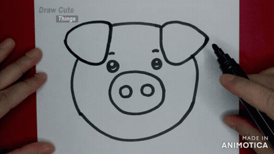 a person is drawing a pig with a marker on a piece of paper that says draw cute things
