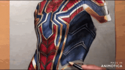 A Person Is Drawing A Spiderman Suit With A Pencil .. GIF