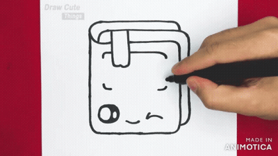 A Person Is Drawing A Towel With A Face On It GIF