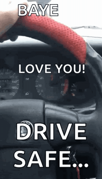 A Person Is Driving A Car With A Red Steering Wheel Cover And The Words `` Love You ! Drive Safe ! '' GIF