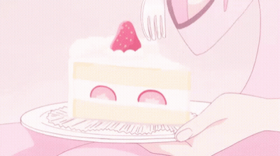 A Person Is Eating A Piece Of Cake With A Fork On A Plate . GIF