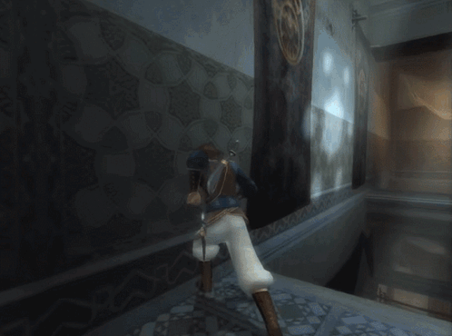 A Person Is Falling Down A Wall In A Room GIF