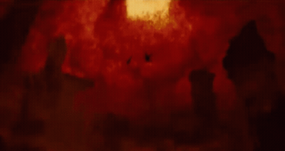A Person Is Falling Through A Hole In The Ground In A Fire Explosion . GIF