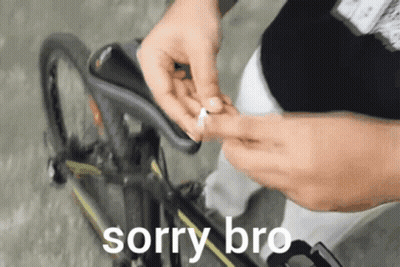 A Person Is Fixing A Bicycle With The Words Sorry Bro Below GIF