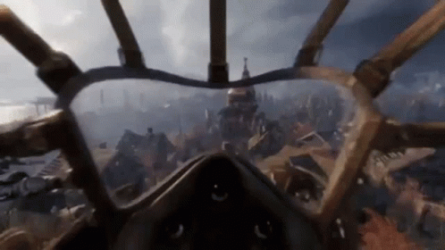 A Person Is Flying A Plane In A Video Game While Wearing A Gas Mask . GIF