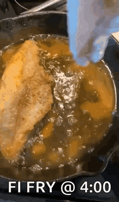 A Person Is Frying A Piece Of Meat In A Skillet With The Words " Fi Fry @ 4:00 " On The Bottom GIF