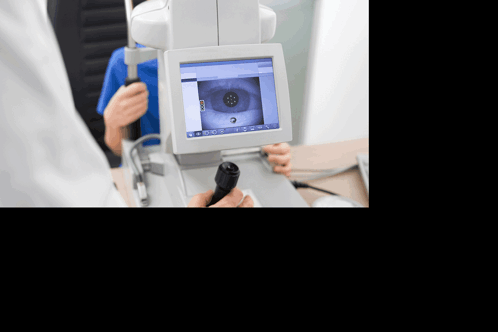 A Person Is Getting Their Eyes Examined By A Doctor GIF