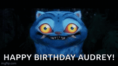 A Person Is Giving Another Person A Credit Card With The Words Touch Grass Happy Birthday Audrey Written On It . GIF