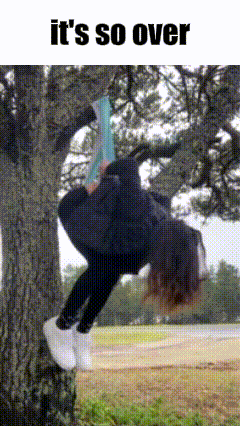 A Person Is Hanging Upside Down From A Tree With The Words It 'S So Over Above Them GIF