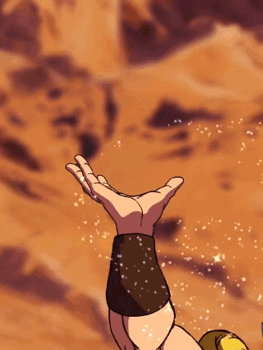 A Person Is Holding A Ball In Their Hand And It Looks Like A Tennis Ball GIF