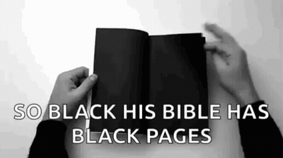 A Person Is Holding A Black Bible With The Words `` So Black His Bible Has Black Pages '' Above It . GIF
