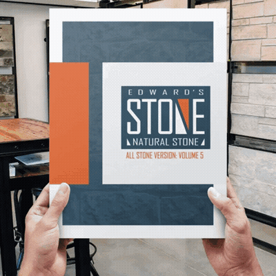 A Person Is Holding A Book Called Edward 'S Natural Stone GIF
