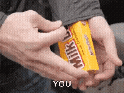 A Person Is Holding A Box Of Milky Way Candy And Says You GIF