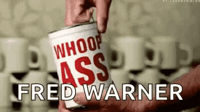 A Person Is Holding A Can Of Whoop Ass Coffee In Their Hand . GIF