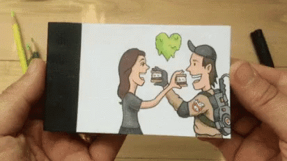 A Person Is Holding A Card With A Cartoon Of A Man And A Woman Giving Each Other A High Five . GIF