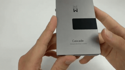 A Person Is Holding A Cascade Device In Their Hand GIF