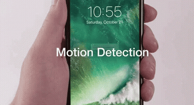 A Person Is Holding A Cell Phone That Says Motion Detection GIF