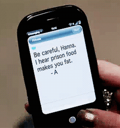 A Person Is Holding A Cell Phone With A Message On It GIF