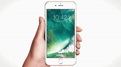 A Person Is Holding A Cell Phone With The App Store App On It GIF