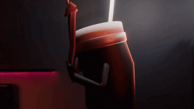 A Person Is Holding A Cup With A Straw In It . GIF