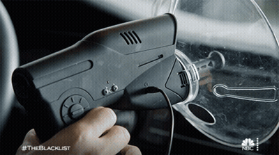 A Person Is Holding A Device That Says #Theblacklist On The Bottom GIF
