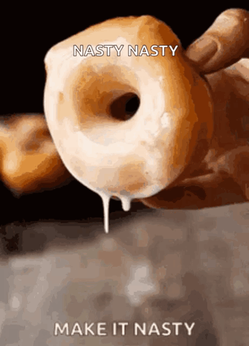 A Person Is Holding A Donut With The Words Nasty Nasty Make It Nasty Below It GIF