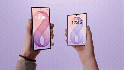 A Person Is Holding A Galaxy Z Fold 8 With The Time Of 12:45 GIF