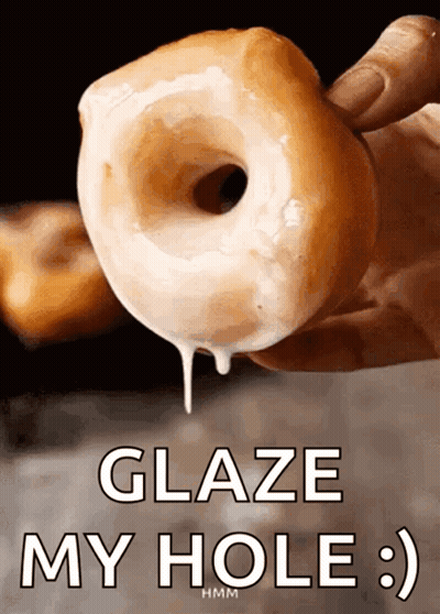 A Person Is Holding A Glazed Donut That Says Glaze My Hole On It GIF